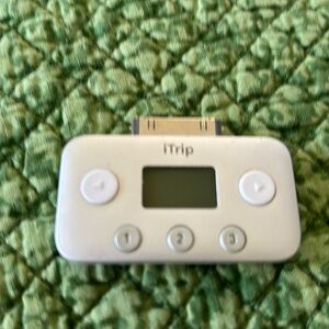 Itrip. Covert your iPod to play through a radio station in your car. .